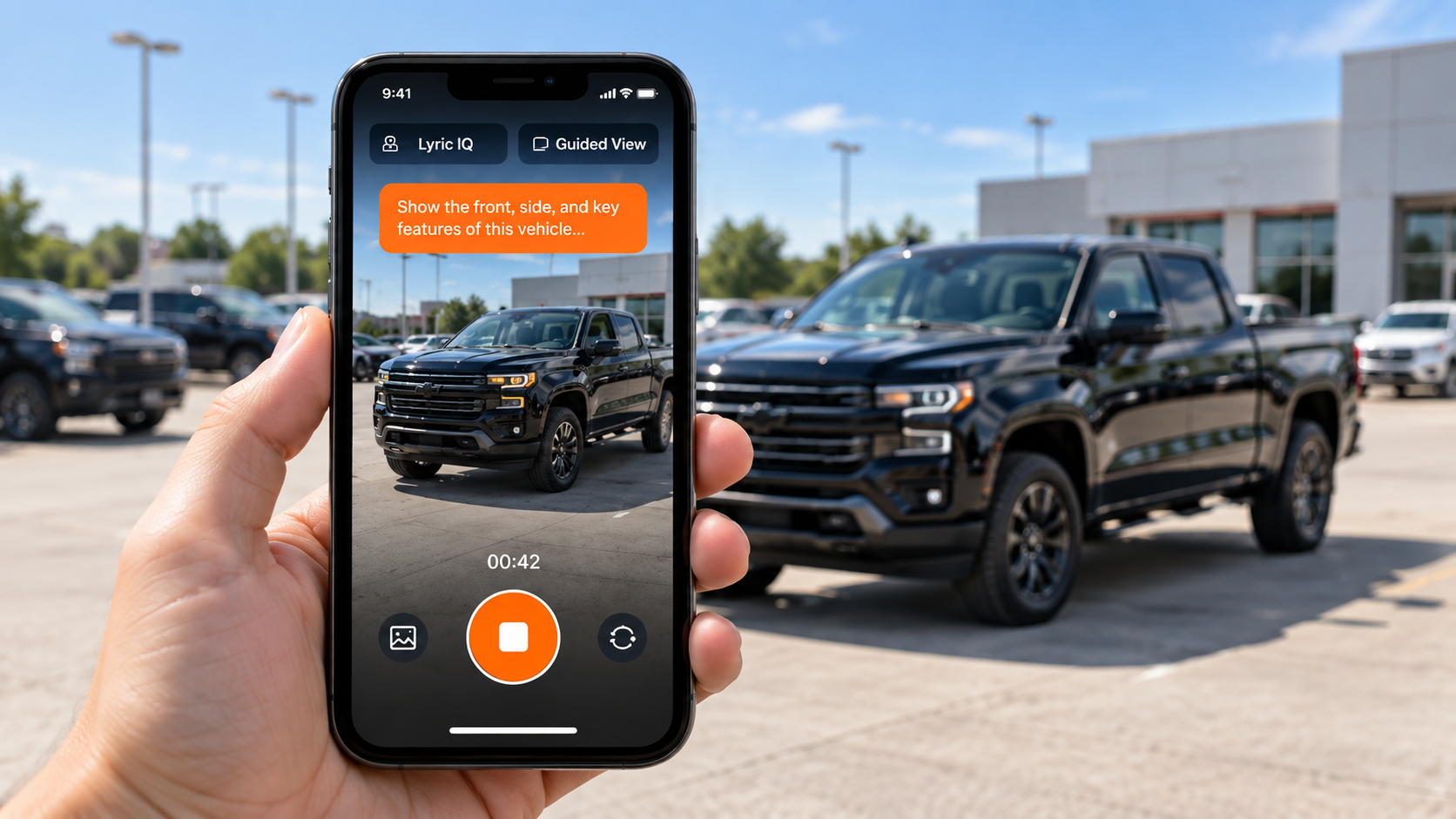 A salesperson’s phone records a black pickup on the lot. The AutoFilm camera prompts “Show the front, side, and key features of this vehicle…”